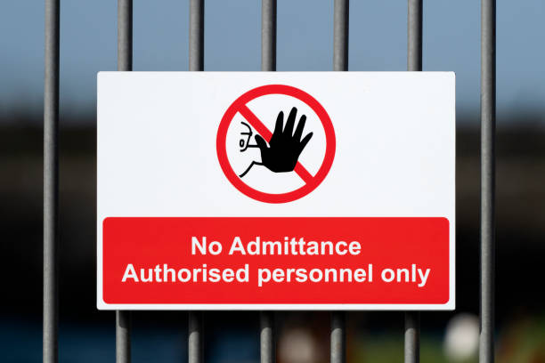 A "No Admittance" sign on a barred gate